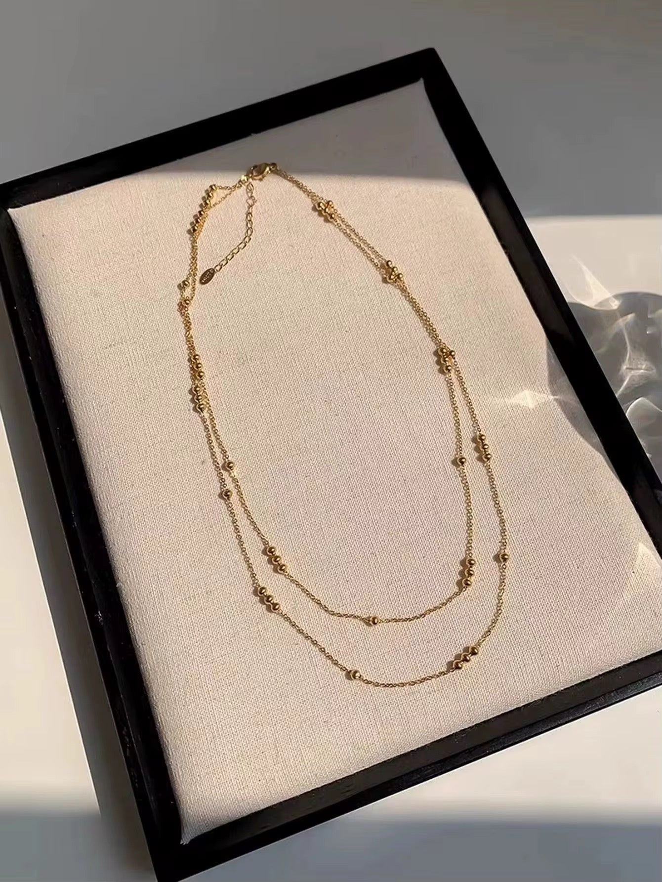 Double layered beaded necklace
