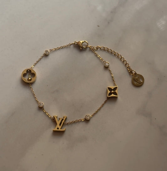 Gold charm bracelet